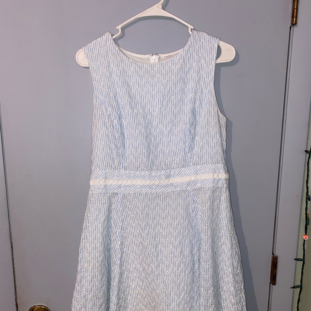 baby blue and white stripped with flower type of design